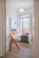 A bed or beds in a room at Apartamentos Alcazaba