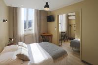 L'Aptois Hôtelにあるベッド