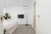 Posteľ alebo postele v izbe v ubytovaní Suite Homes Penthouse Capuchinos