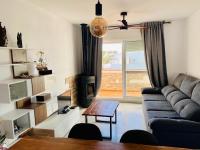 Posedenie v ubytovaní Encantador ático con chimenea y piscina en Almería