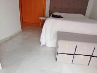Posteľ alebo postele v izbe v ubytovaní Encantador ático con chimenea y piscina en Almería