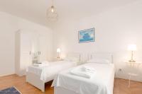 Posteľ alebo postele v izbe v ubytovaní Apartment Tana