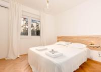 Posteľ alebo postele v izbe v ubytovaní Apartment Tana