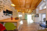 A kitchen or kitchenette at Casa nel Borgo - Il Gufo
