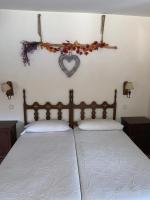 Postel nebo postele na pokoji v ubytování Casa rural Laguna Herrera