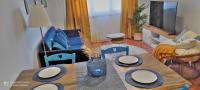 Posezení v ubytování Malpica Greek Home