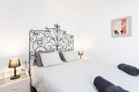 Postel nebo postele na pokoji v ubytování ALCALA Perfect Stay by Sunkeyrents