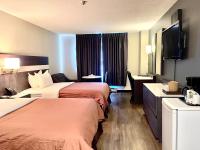 Auberge de la Gareにあるベッド