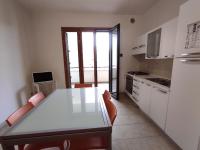 A kitchen or kitchenette at Finestrelle Pied à terre a Otranto