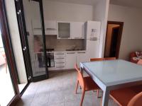 A kitchen or kitchenette at Finestrelle Pied à terre a Otranto