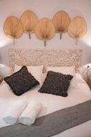 Posteľ alebo postele v izbe v ubytovaní Apartamento Alma Sevilla