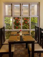 Restaurace v ubytování Rosewood by Nature Resorts and Stays