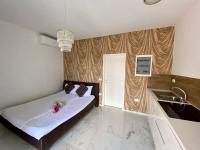 Postel nebo postele na pokoji v ubytování SunVilla