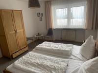 Postel nebo postele na pokoji v ubytování Ferienwohnung- Pfenniggeiger