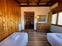 Posteľ alebo postele v izbe v ubytovaní Hotel New Genziana