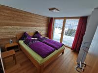 Postel nebo postele na pokoji v ubytování Chalet Enzian