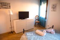 A television and/or entertainment centre at Sole & Luna apartments