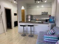 Kuchyň nebo kuchyňský kout v ubytování Apartamentos en Playa de Samil Primera Línea de playa Pe Na Areia