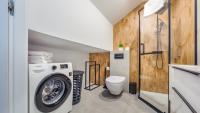 Kúpeľňa v ubytovaní Apartamenty Sun & Snow Baltic Sun z basenem i placem zabaw