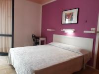 Posteľ alebo postele v izbe v ubytovaní Hotel Zenith