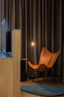 A television and/or entertainment centre at Ocean Drive Madrid