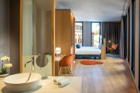 A bed or beds in a room at Ocean Drive Madrid