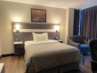Auberge de la Gareにあるベッド