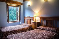 Postel nebo postele na pokoji v ubytování Casas Rurales Taramundi Verde