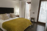 A bed or beds in a room at HC6 Boutique Marbella - Adults Only