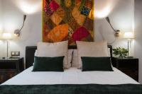 A bed or beds in a room at HC6 Boutique Marbella - Adults Only