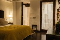 A bed or beds in a room at HC6 Boutique Marbella - Adults Only