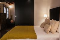 A bed or beds in a room at HC6 Boutique Marbella - Adults Only