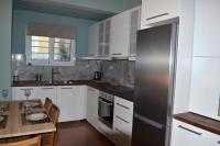 Kuchyňa alebo kuchynka v ubytovaní Cosy Apartments Daphne