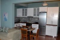 Kuchyňa alebo kuchynka v ubytovaní Cosy Apartments Daphne