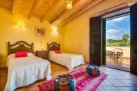 Posteľ alebo postele v izbe v ubytovaní Ideal Property Mallorca - Can Nyany Buger