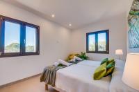 Posteľ alebo postele v izbe v ubytovaní Ideal Property Mallorca - Sa Canova d'Ariany
