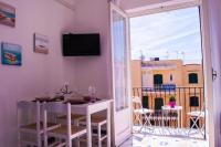 A television and/or entertainment centre at Nido del Sole Ischia