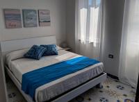 A bed or beds in a room at Nido del Sole Ischia