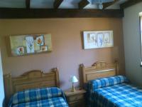 Postel nebo postele na pokoji v ubytování Casa Rural Valle Tosande