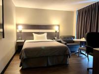 Auberge de la Gareにあるベッド