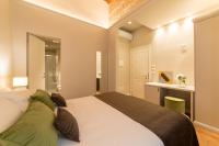 A bed or beds in a room at Atelier Altafronte