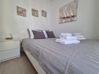 Postel nebo postele na pokoji v ubytování Holiday House Nataly