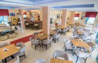 Reštaurácia alebo iné gastronomické zariadenie v ubytovaní Primavera Hotel