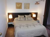 Postel nebo postele na pokoji v ubytování Hostal Eixample