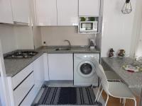 Kuchyň nebo kuchyňský kout v ubytování Apartamentos Bela Vista