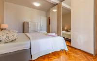Posteľ alebo postele v izbe v ubytovaní Apartment Melanie