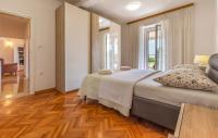 Posteľ alebo postele v izbe v ubytovaní Apartment Melanie