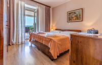Posteľ alebo postele v izbe v ubytovaní Apartment Melanie