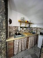 Kuchyňa alebo kuchynka v ubytovaní La Piccola Grotta Ursino