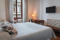 Posteľ alebo postele v izbe v ubytovaní Il Salotto Di Firenze